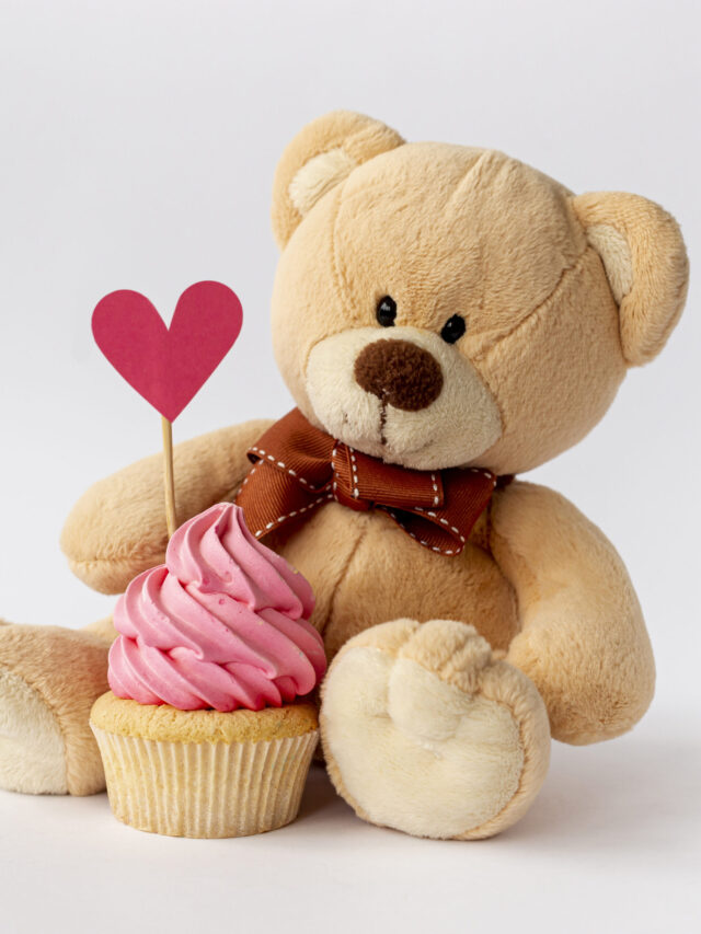 front-view-cute-little-baby-boy-cupcake-teddybear